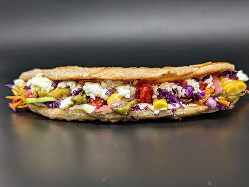 Sandwich végétarien Rome-Delhi par le restaurant dark kitchen Polychrone à Marseille